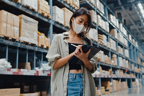 young-asian-businesswoman-manager-wearing-face-mask-warehouse-using-digital-tablet-checkin
