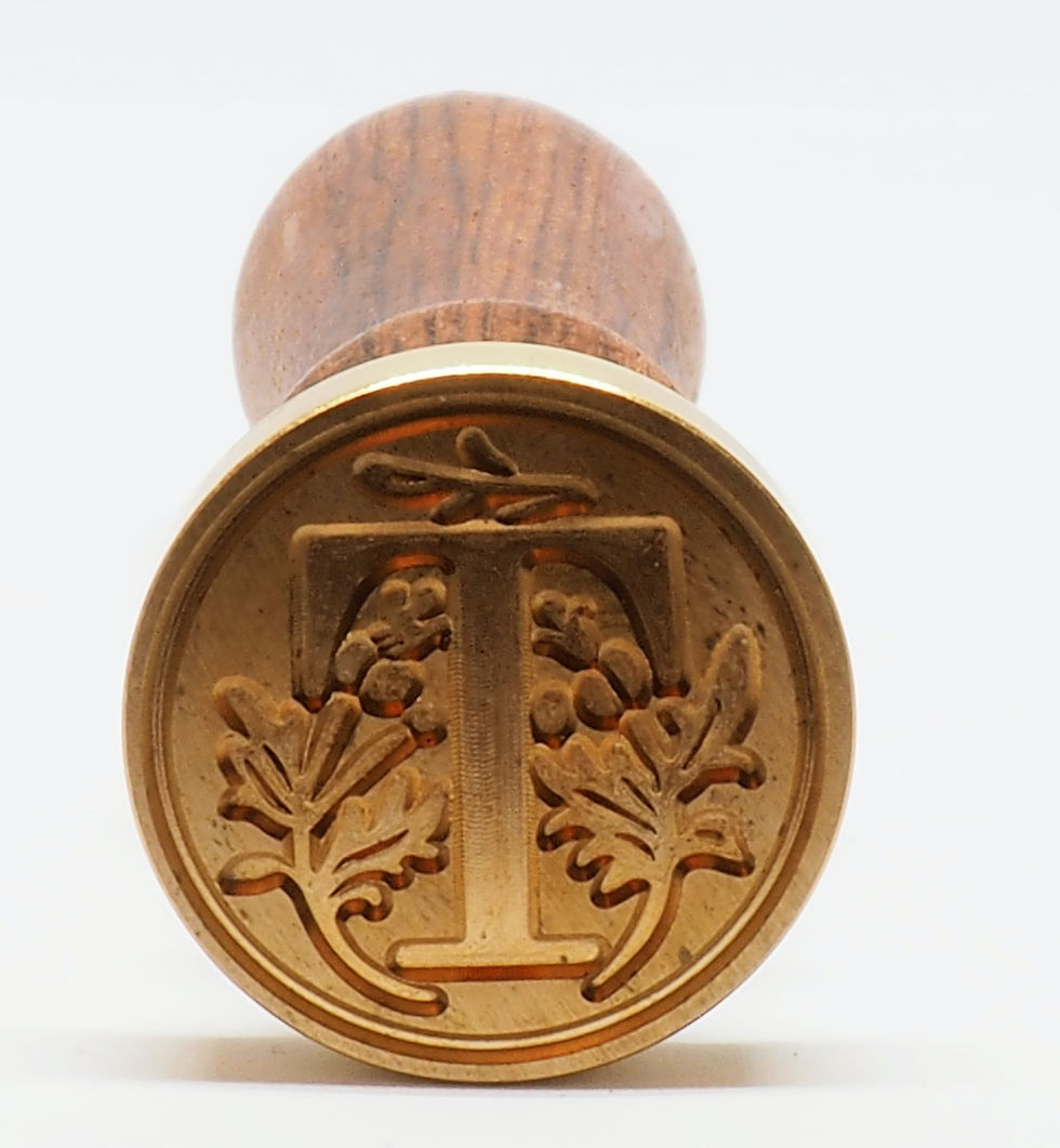 A stamp of the letter /t/