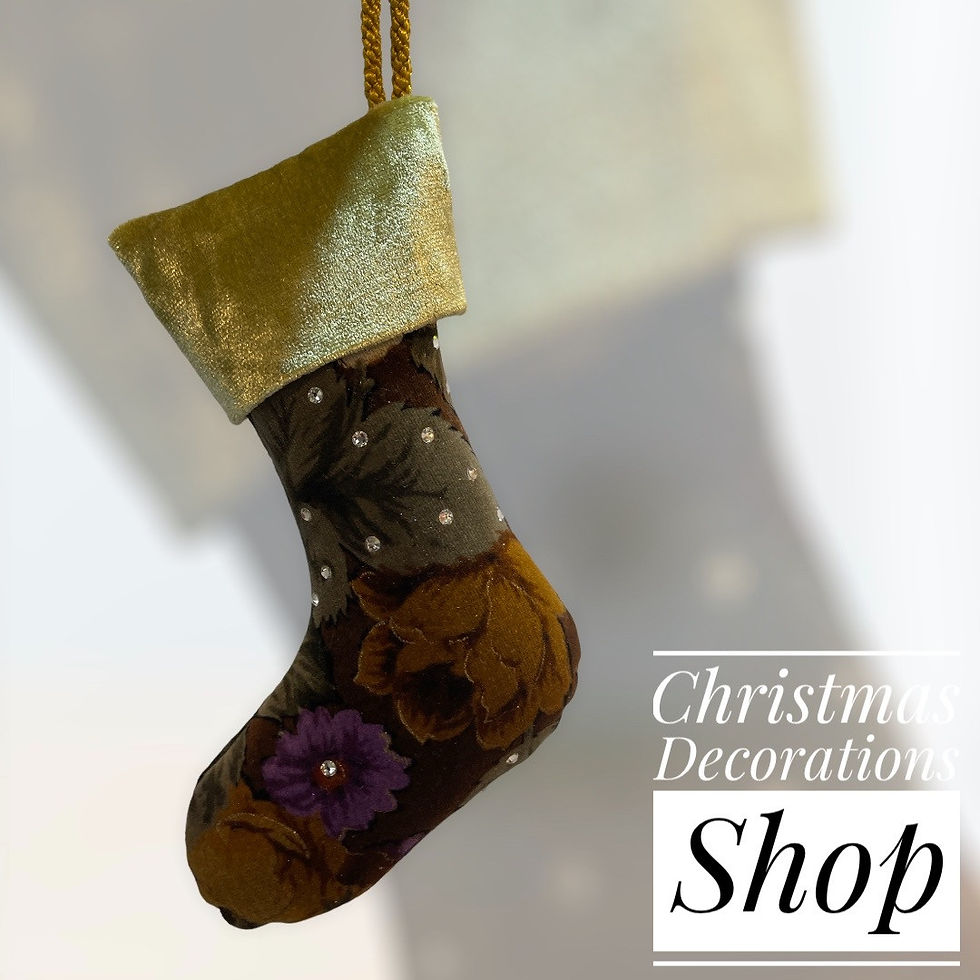 Luxury handmade UK Christmas mini stocking in floral velvet print with Swarovski crystals and a gold hanging loop.