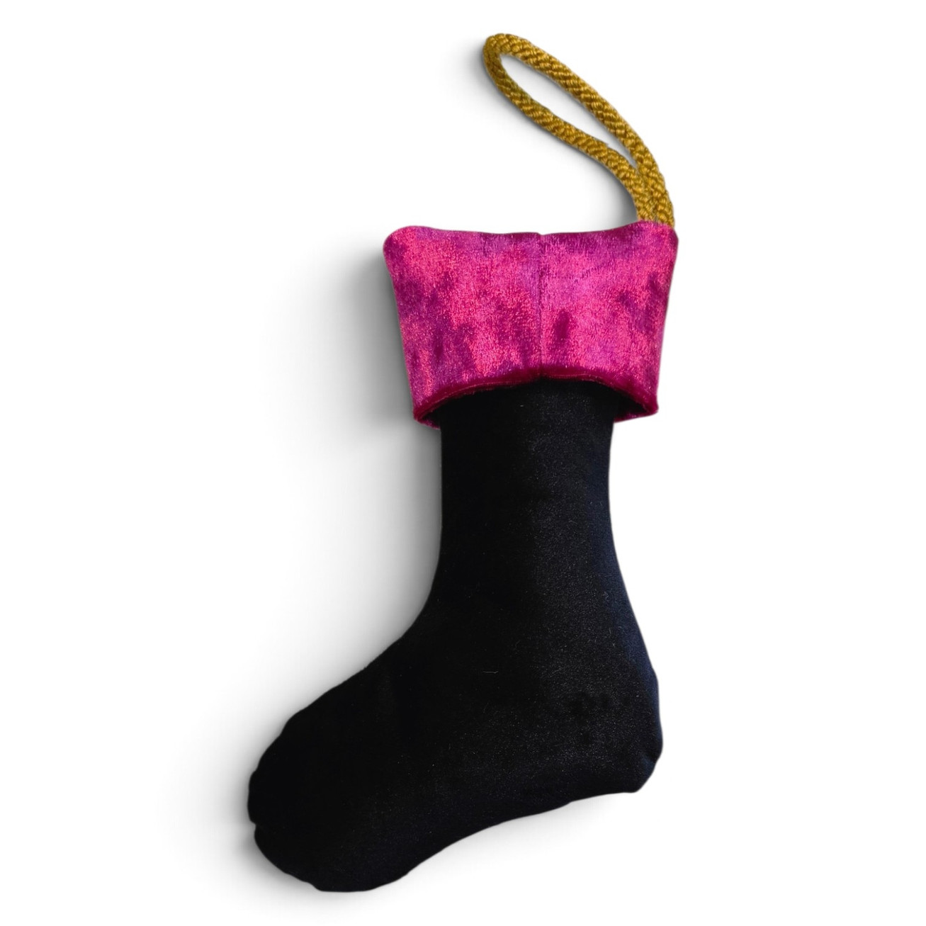 Reverse side of 9cm mini Christmas stocking in plush black velvet with folded magenta velvet cuff and thick gold hanging loop