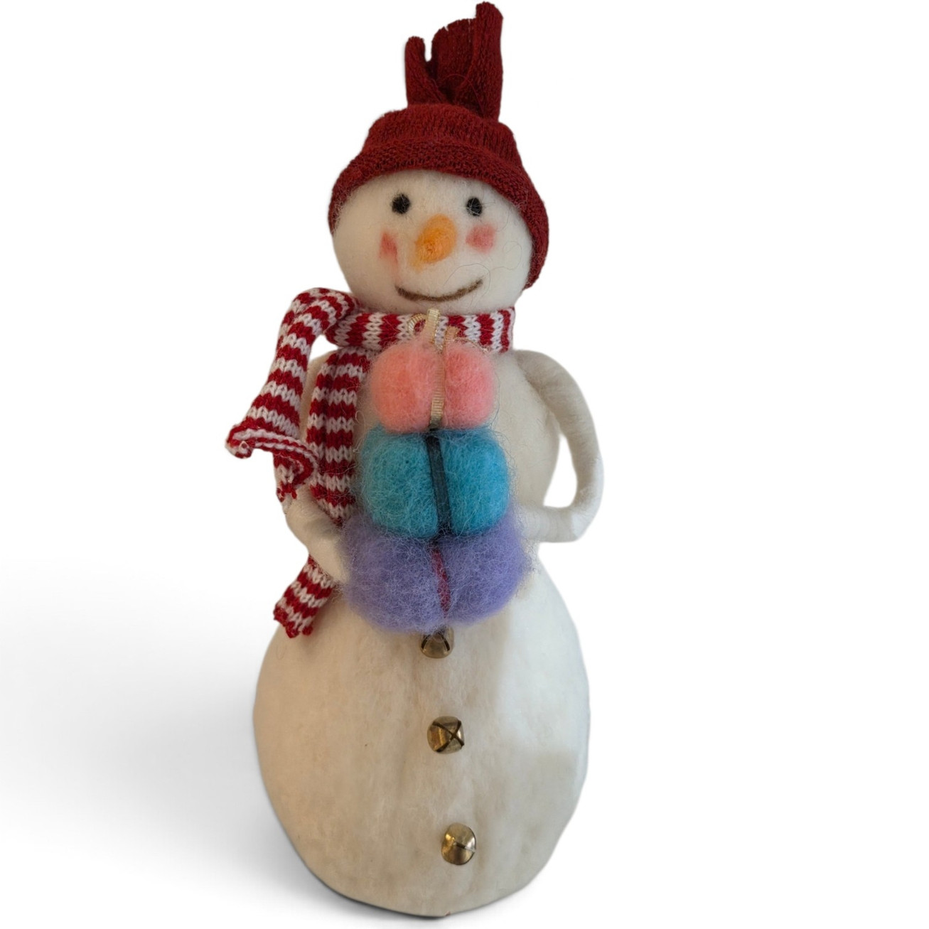 27cm handmade needle-felted wool snowman figurine wearing a colourful scarf and red festive beanie hat on a white background.