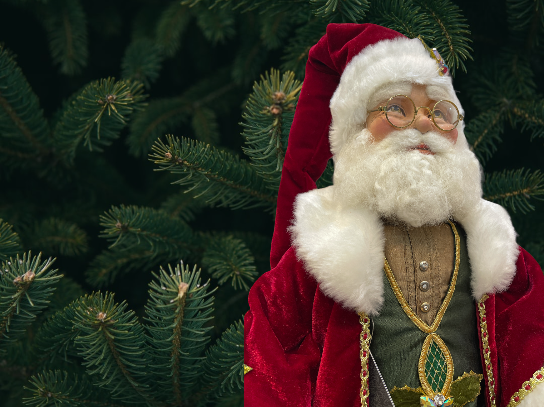 Close-up of Katherine's Collection Tartan Santa face featuring gold-rimmed glasses and a natural wool beard