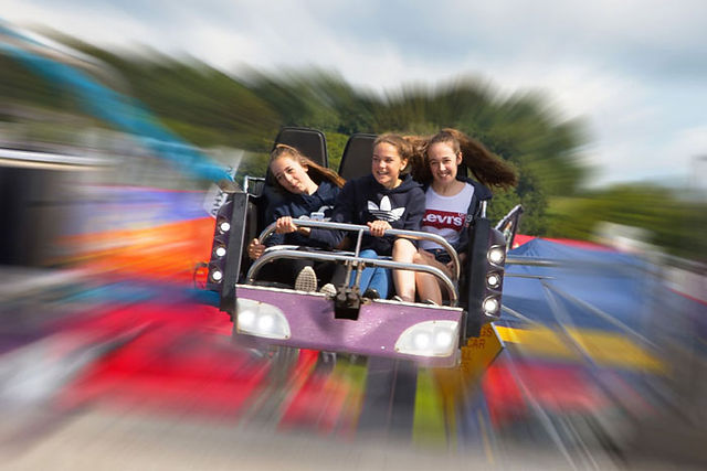 3 girls on ride at fairground