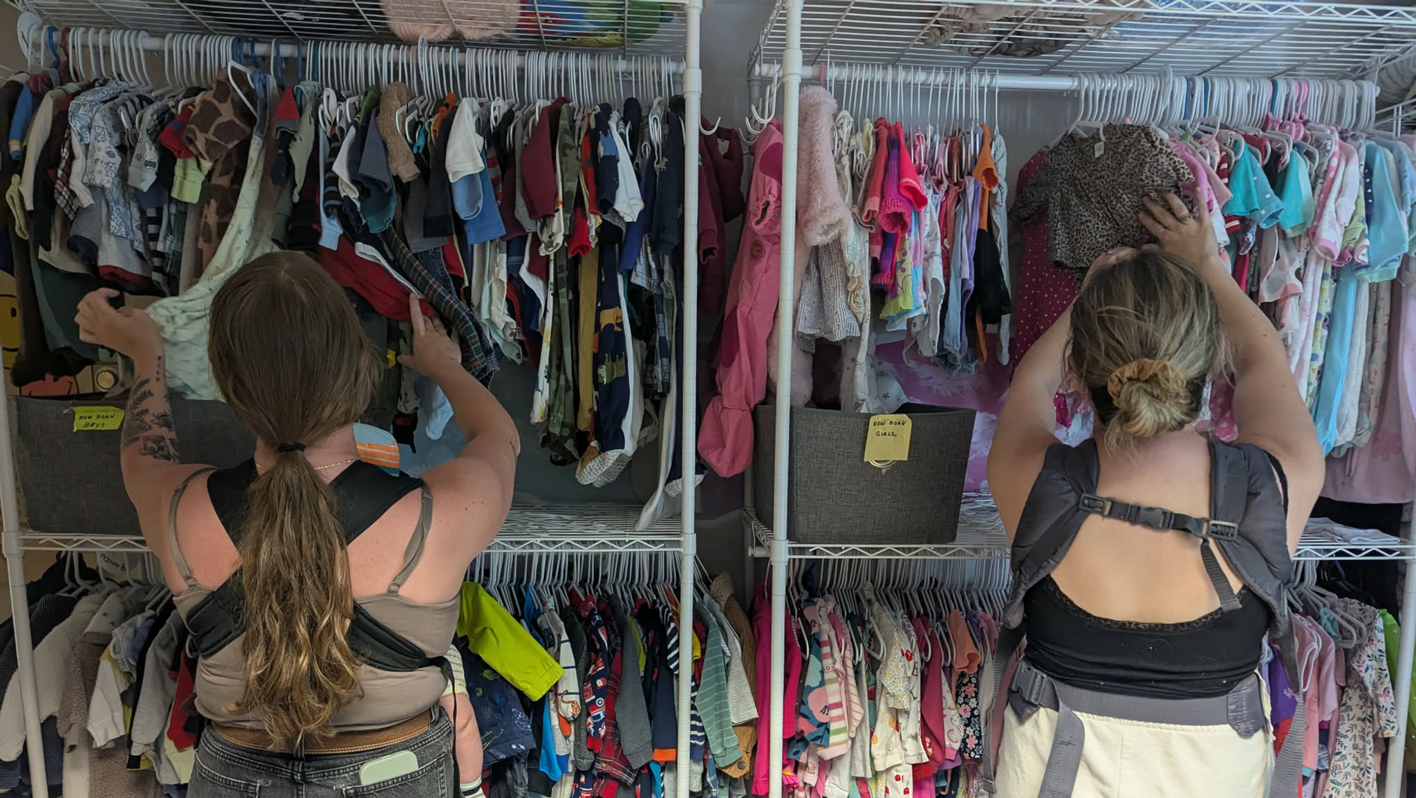 participants sorting through clothes at Options Pregnancy Centre Lennoxville clothing exchange.