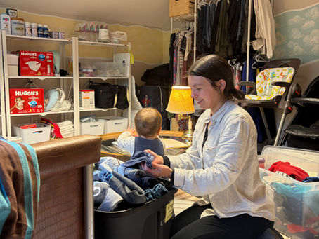 A mom looking through Nadine's Closet at Options Pregnancy Centre Lennoxville