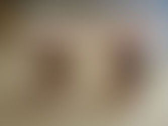 Two mugs with flowers on them