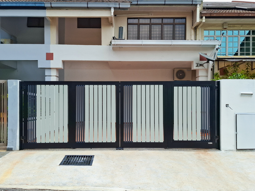 Modern home exterior with black gate and driveway. HOME. Residential building in view.