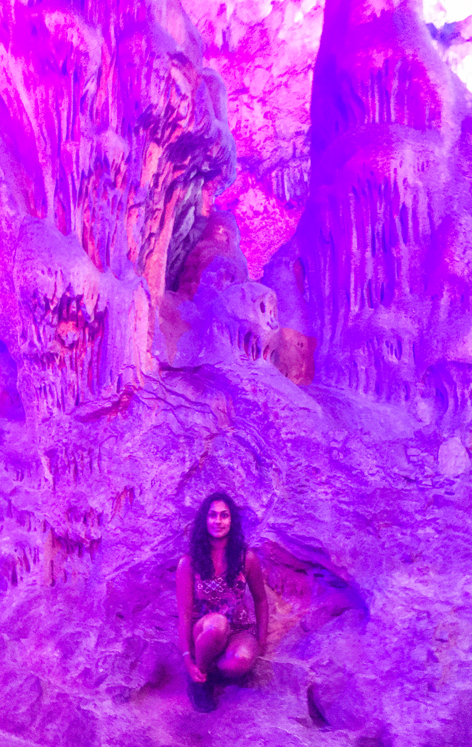 girl in St Michael's Cave, Gibraltar