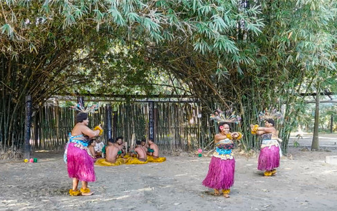 female Fijian dancers performing meke