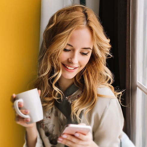 Beautiful Girl Playing with Mobile