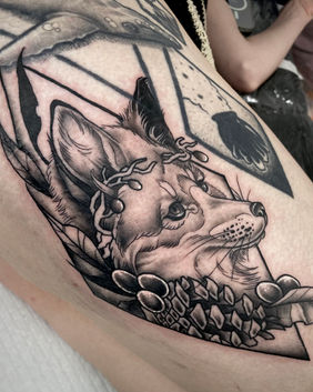 Fox druid tattoo in black and grey