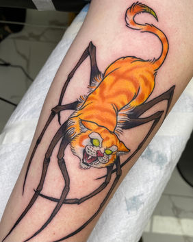 Mutant spider/cat tattoo