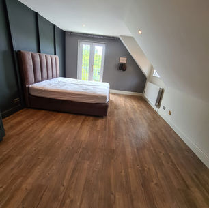 Amtico Spacia Dry cedar LVT installed to this Bedroom in Lindfield
