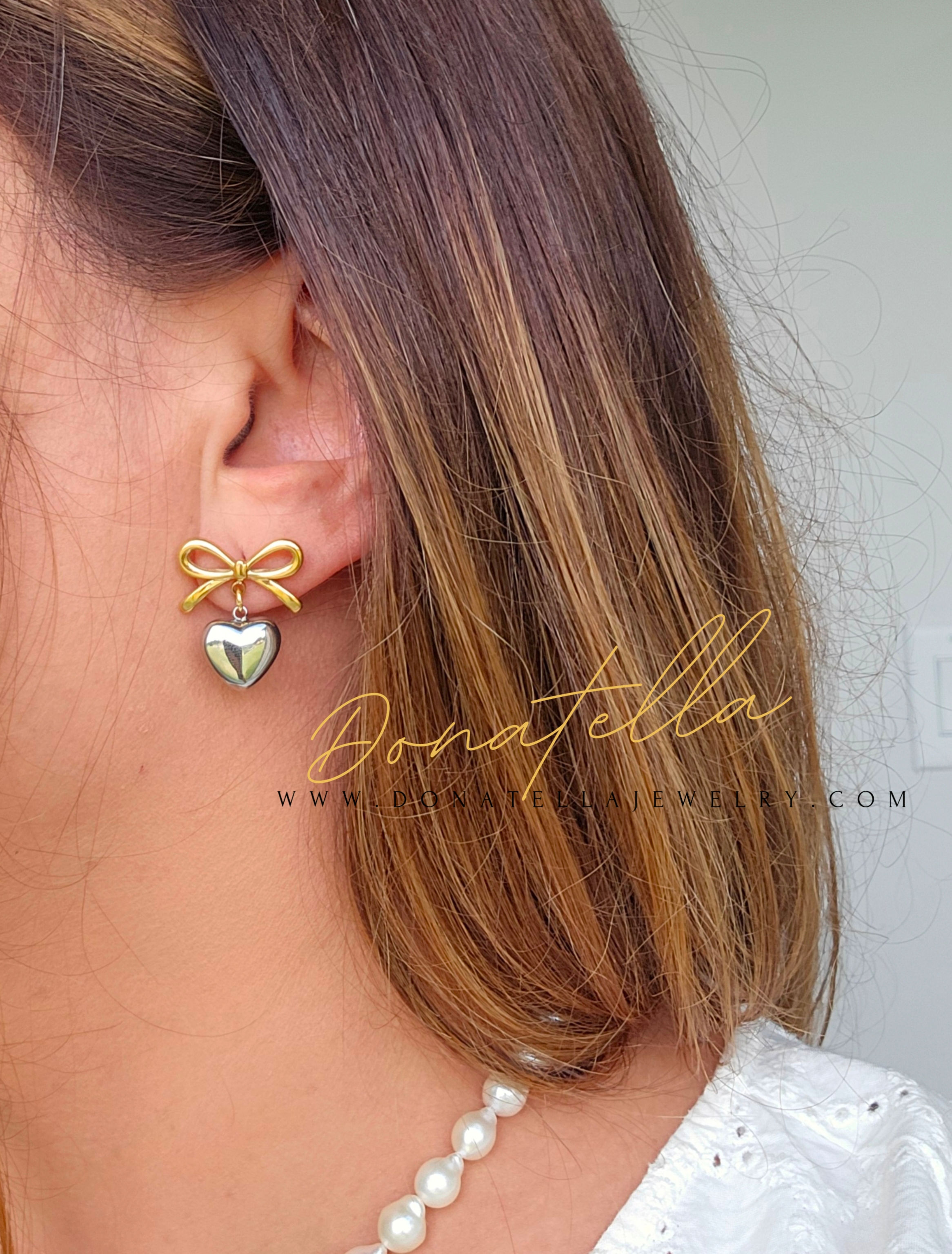 Bow tie and heart earrings by Donatella