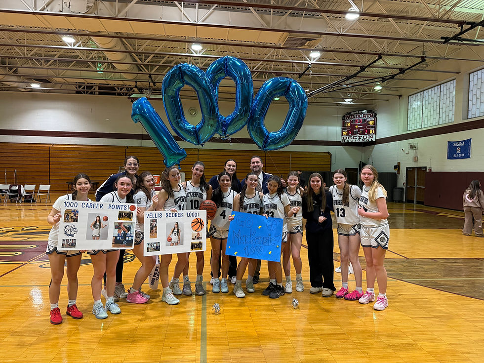 Mackenzie Vellis and the RHS Girls Basketball team