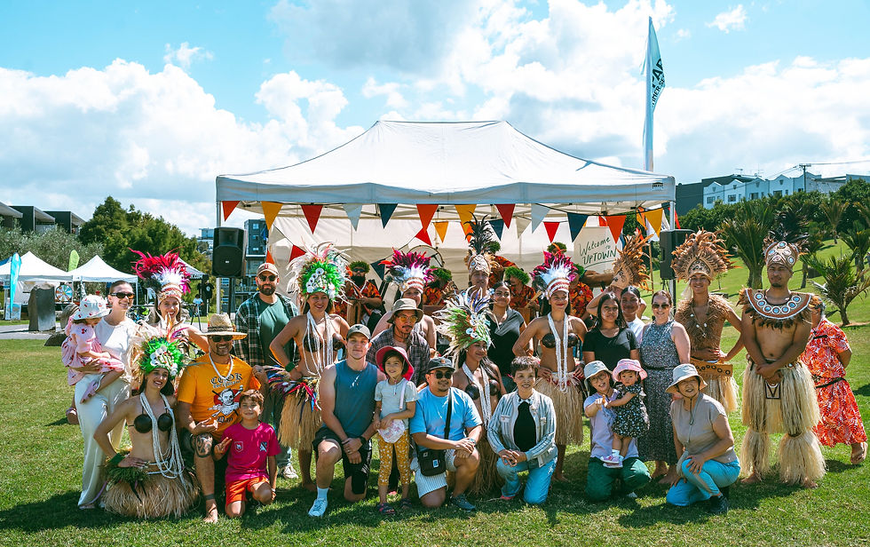 Pasifika performer shot with crowd in front of stage