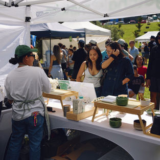A view of customers from inside the Matcha stall looking out