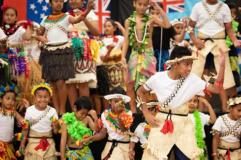 A fun and colourful photo of the Kiribati Rodney Community Youth group performing.