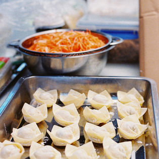 Vegan Cuisine displays a tray of their popular dumplings