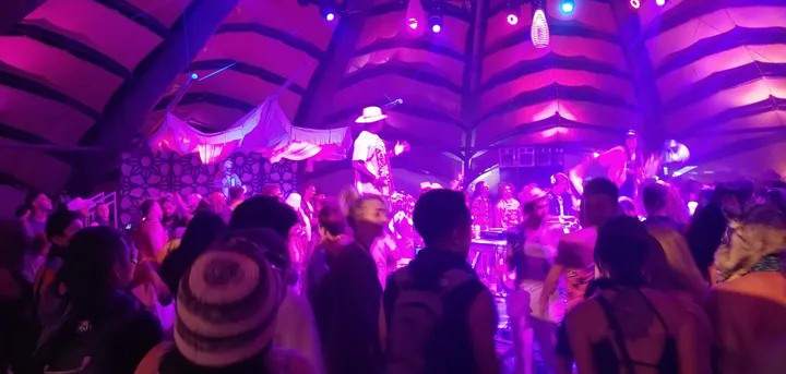 A room full of people and live music.