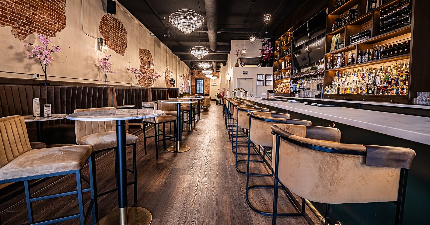 The completed bar space, with installed speakers above the seating.