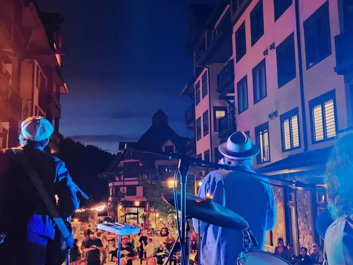 Live music on an outdoor evening stage.