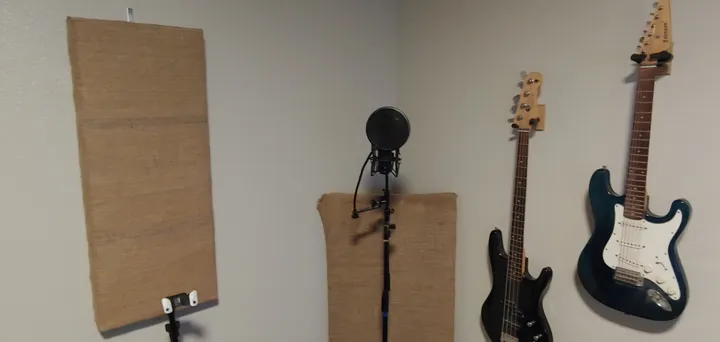 Microphones and basses ready for a recording project.