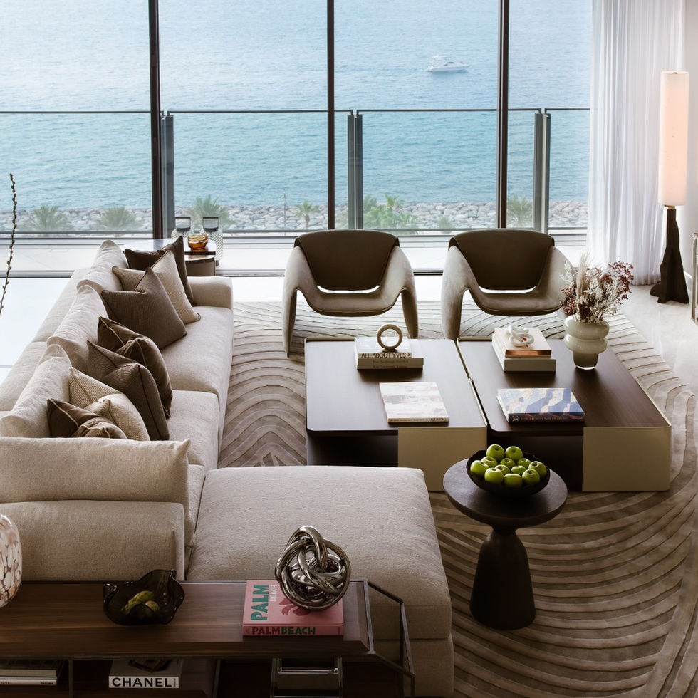Luxury living room with ocean view, modern furniture, spacious layout, and Nu Projects Dubai