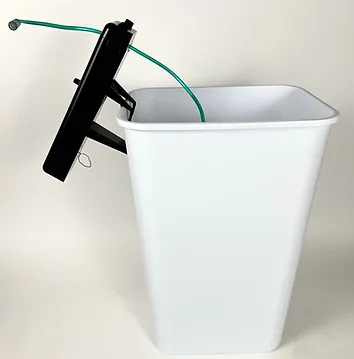 side view_on white trash can_2022_edited.webp
