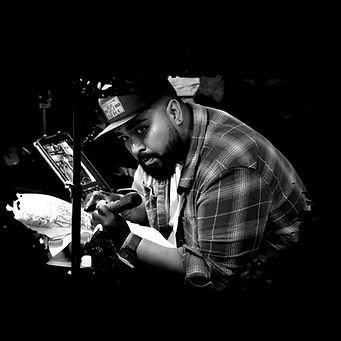 Tattoo artist Tattooing in a tattoo convention