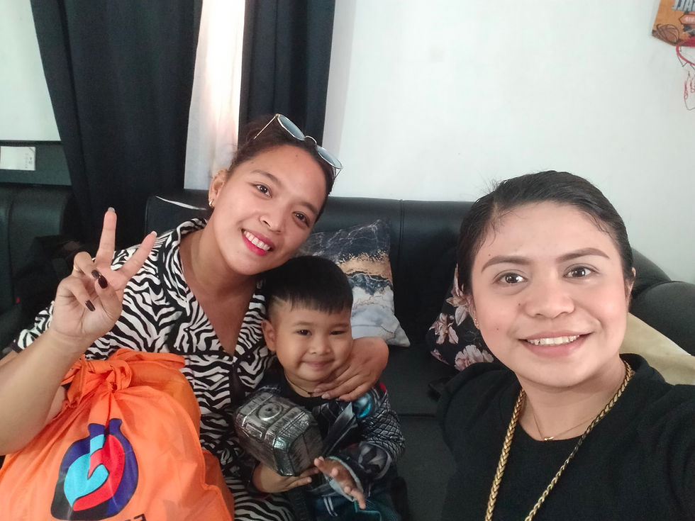 Mother and son joined by Shiela Mae Baliber, EPCALM Social Worker.