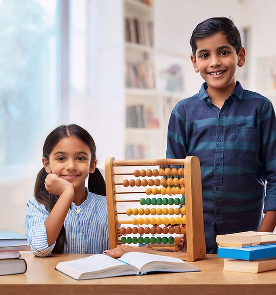 Firefly-kids-with-table-infront-with-abacus-and-books-78805-1024x796.jpg