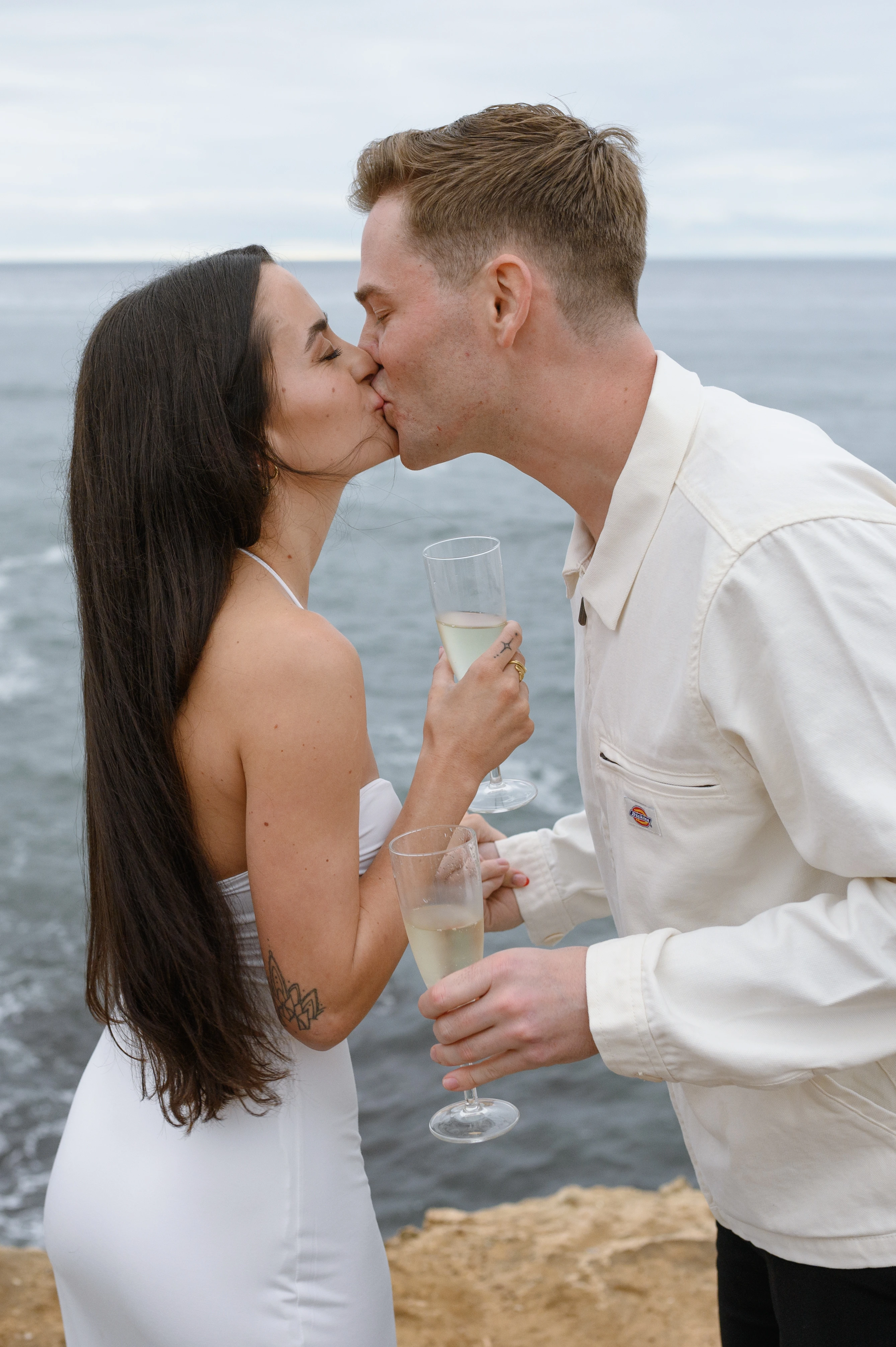 champagne celebration after proposal Sunset Cliffs
