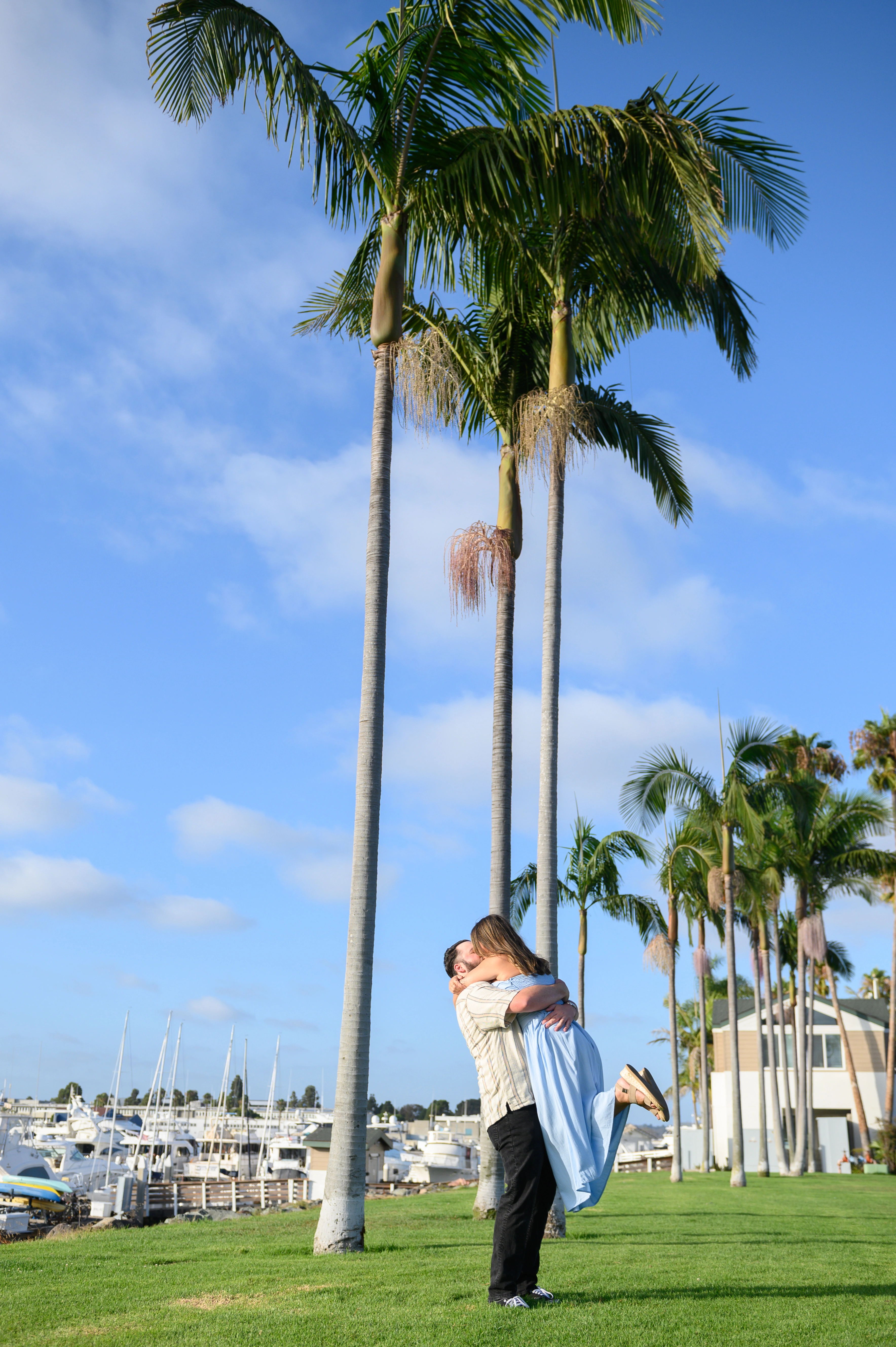 Romantic couple embracing in San Diego, showcasing the love and joy of a proposal, perfect for a San Diego proposal photographer.