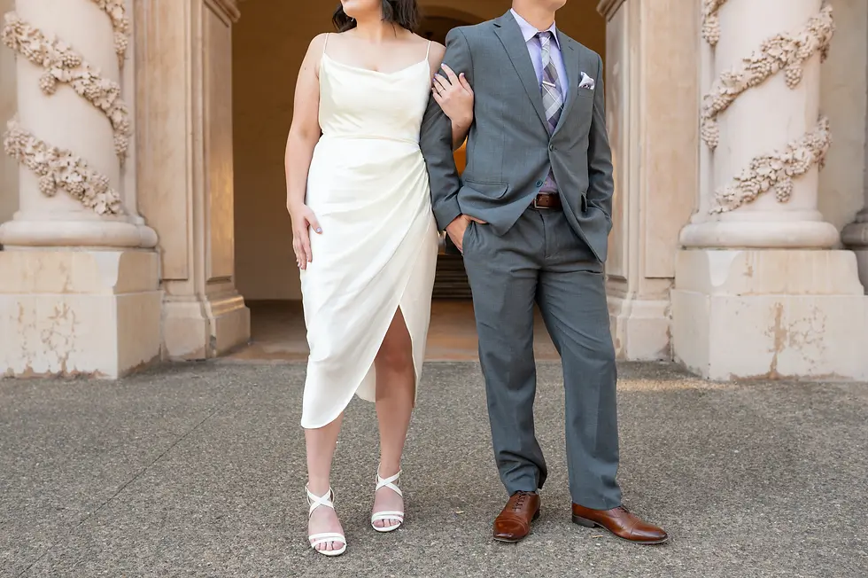 Close-up of a newly eloped couple sharing an intimate moment in Balboa Park, San Diego