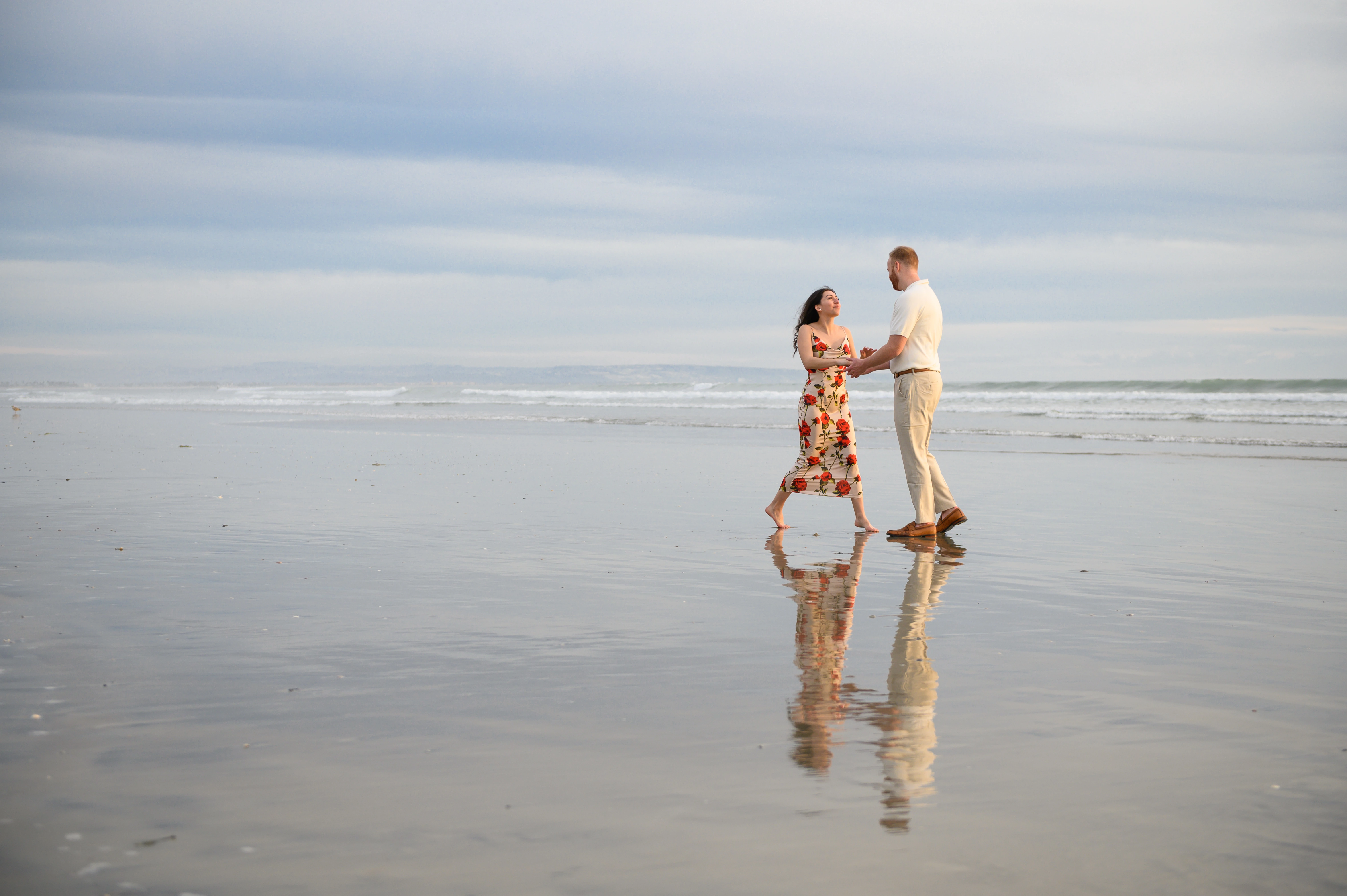 couple dancing on beach after proposal Coronado
