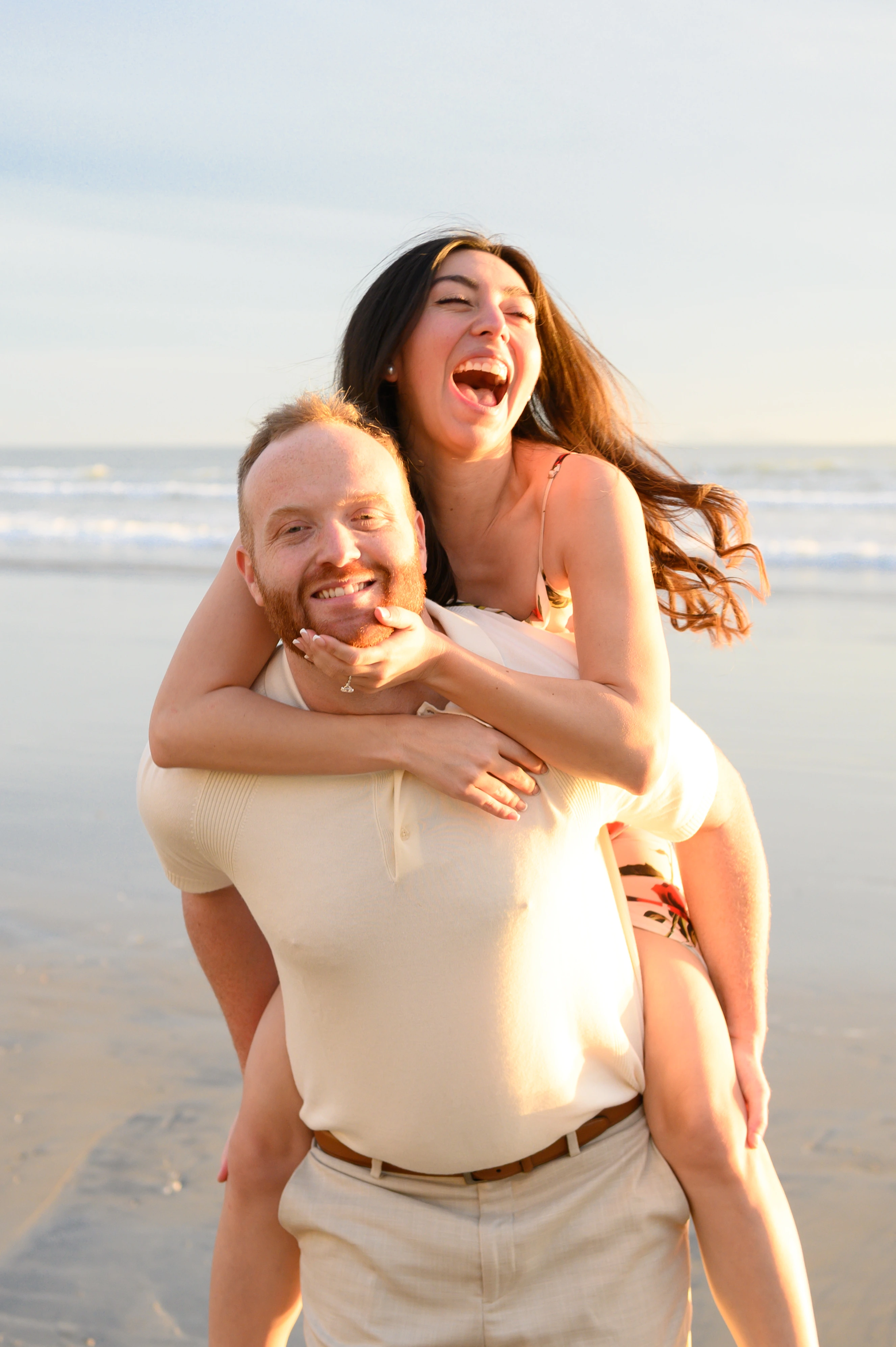 close embrace and happeiness  couple beach proposal Coronado