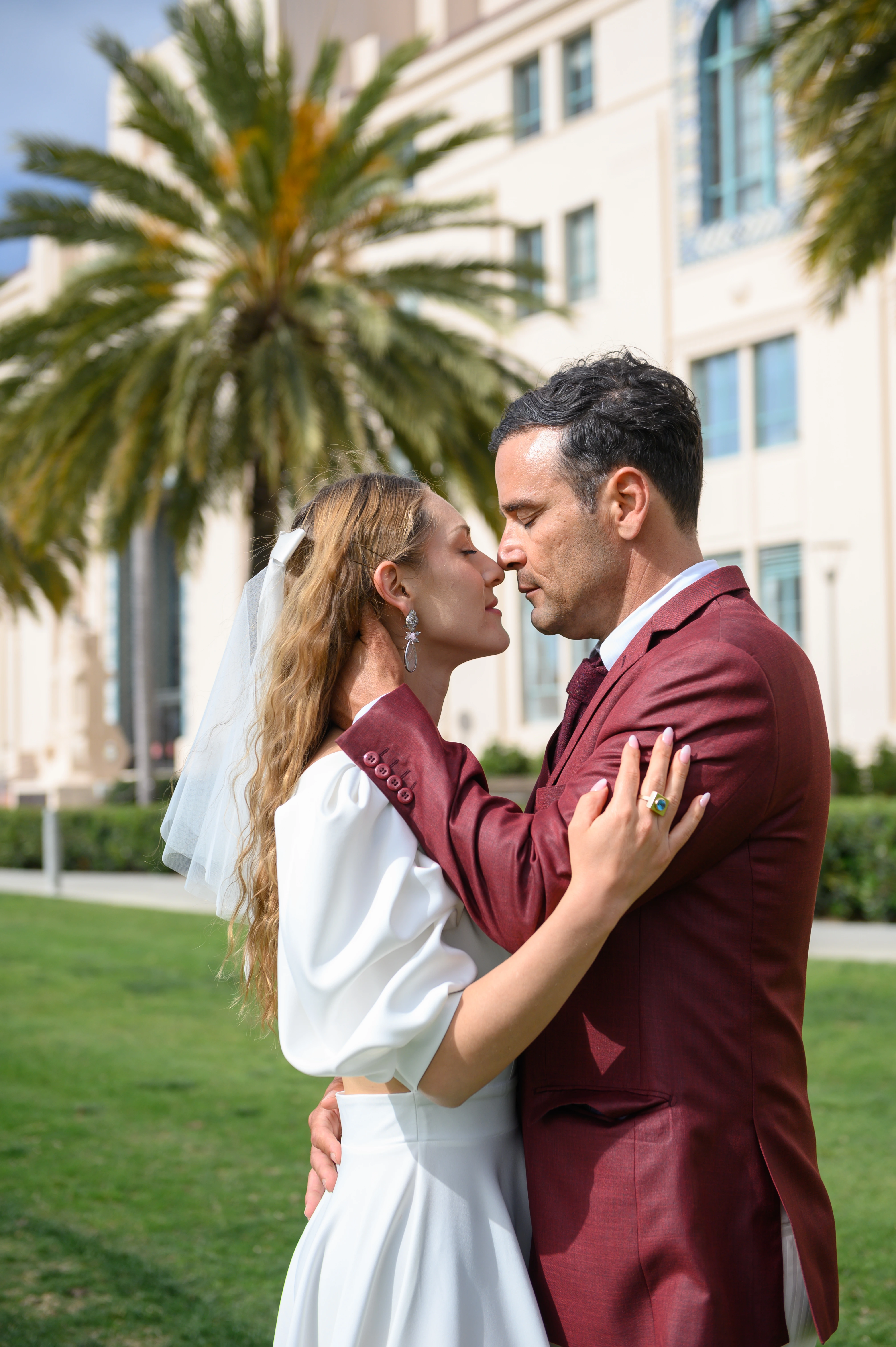san diego elopement couple sharing a quite moment in front of the courthouse