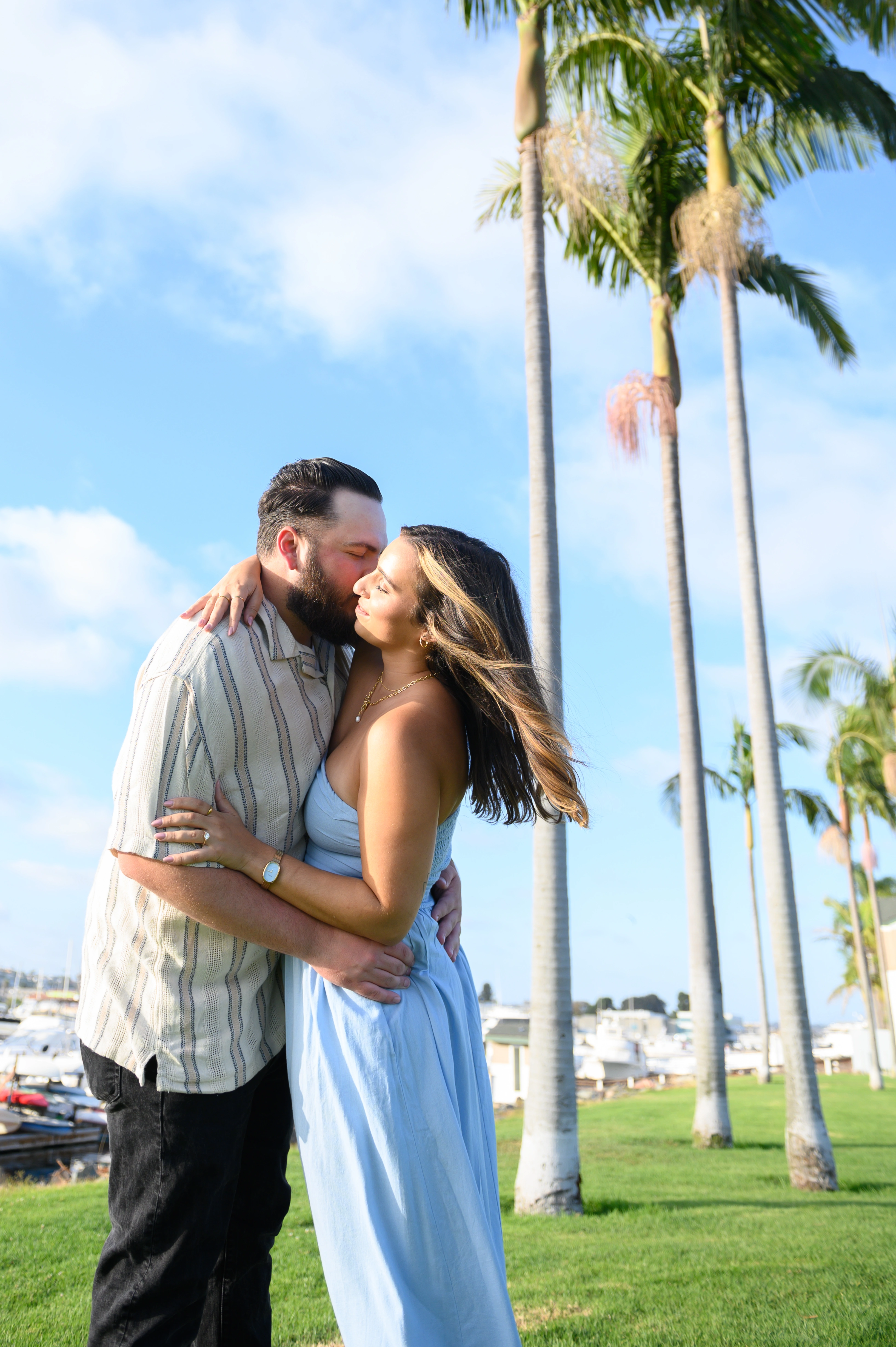 Intimate moment between a couple in San Diego, ideal for a romantic engagement photographer capturing proposals.