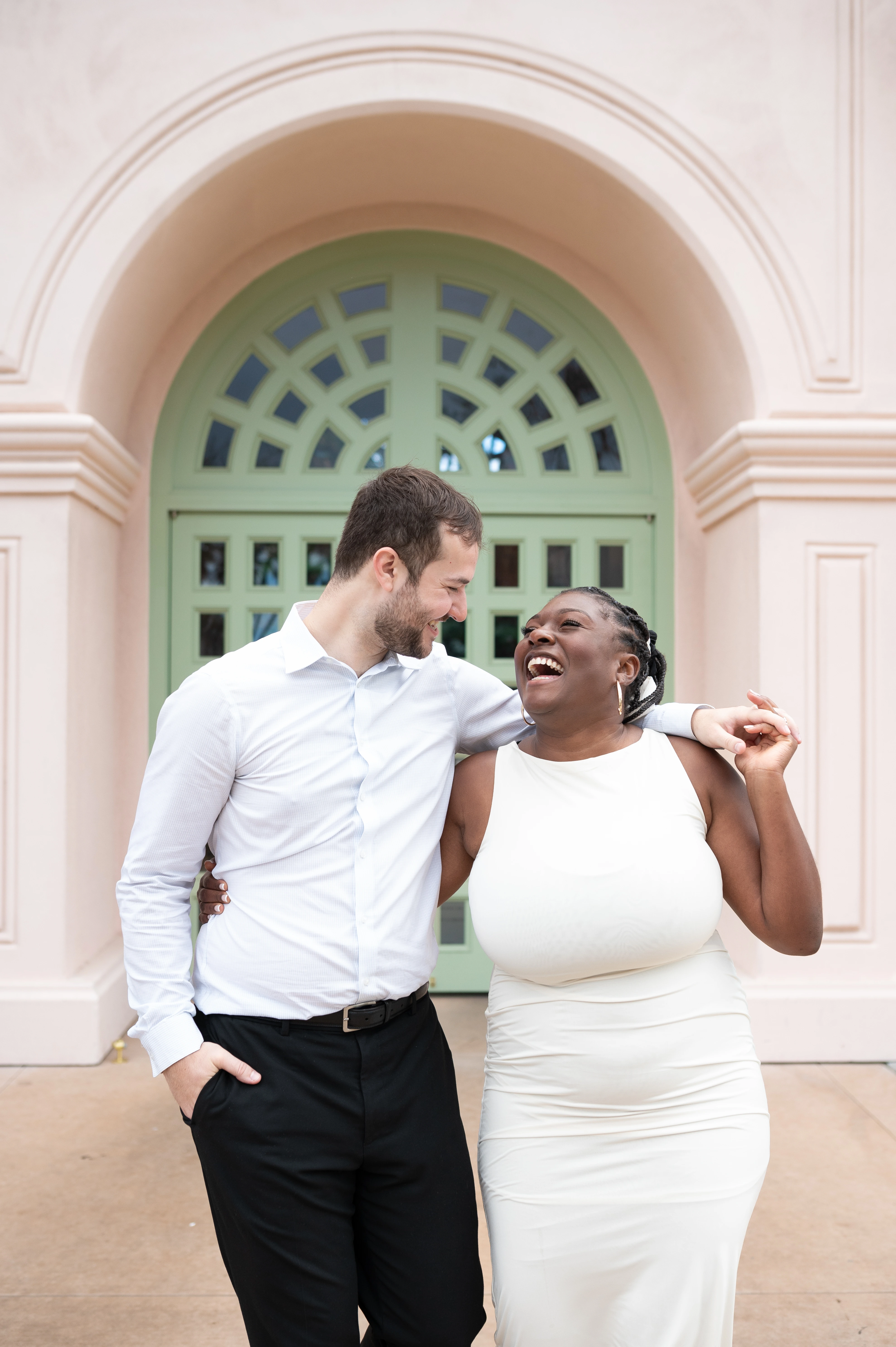 couple laughing after proposal Balboa Park San Diego