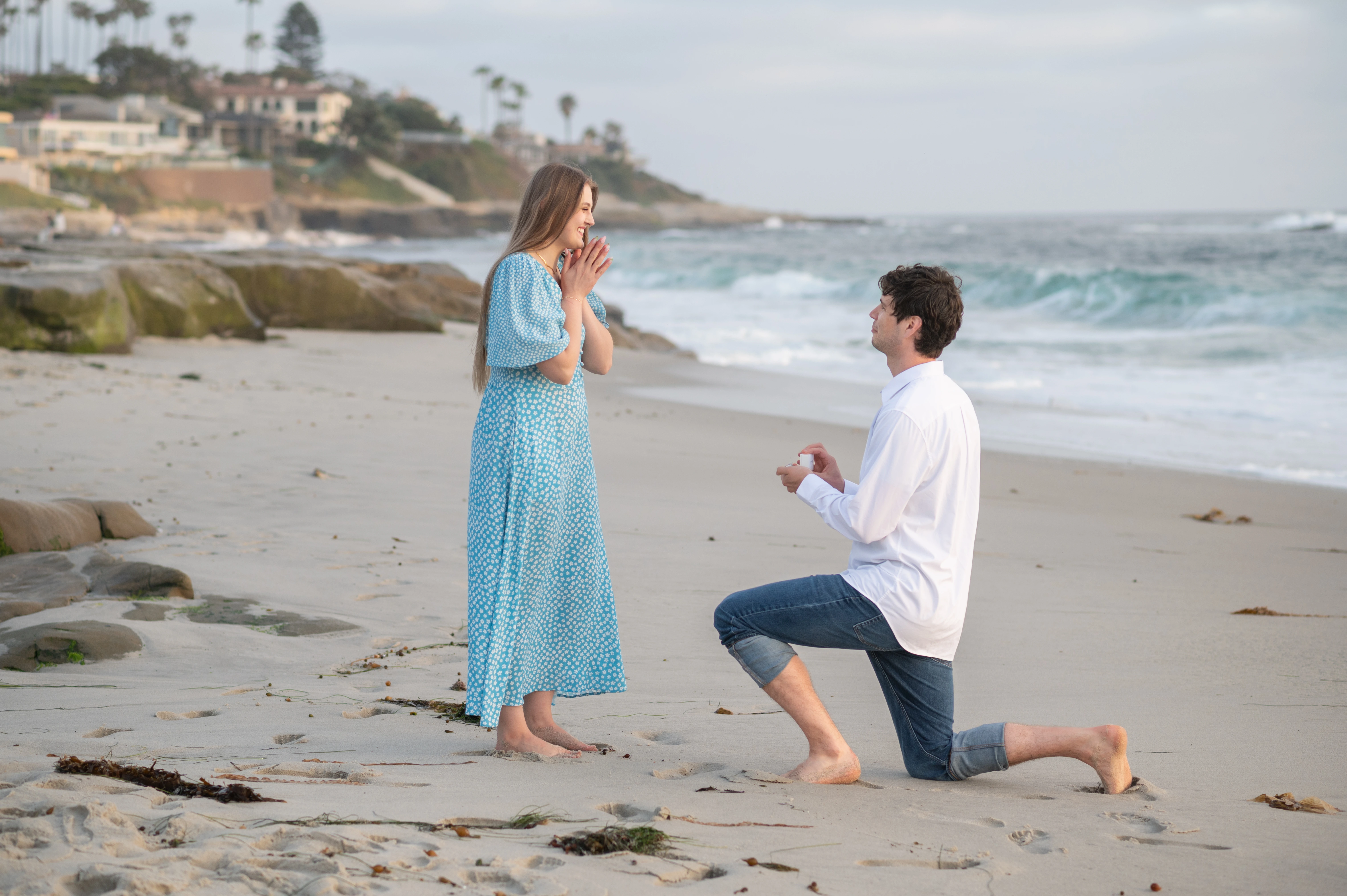 Windansea Beach proposal at sunrise in La Jolla with soft ocean light