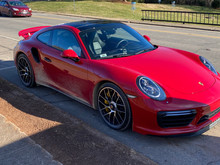 Prayer, Ice, Steep Ledge and a Red Porsche