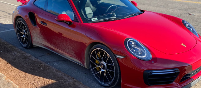 Prayer, Ice, Steep Ledge and a Red Porsche