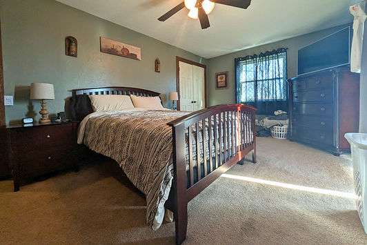 Primary Bedroom Carrollton Ohio Country Home on 21.7 Acres with Barn, Pond & Scenic Views