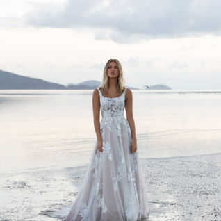 Square neck, low scoop back. Floral lace ivory wedding dress. Madi Lane.