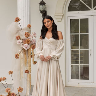 Madi Lane A line wedding dress. strapless, detachable sleeves.