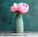 Peonies in a hand crafted ceramics vase 