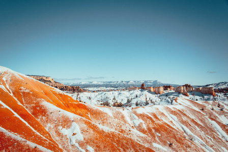 orange rocks and snow in Bryce Canyon