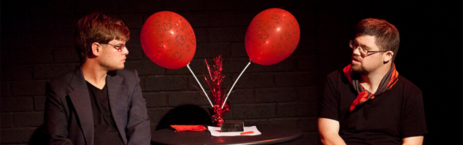Dave and Michel sitting with balloons.png