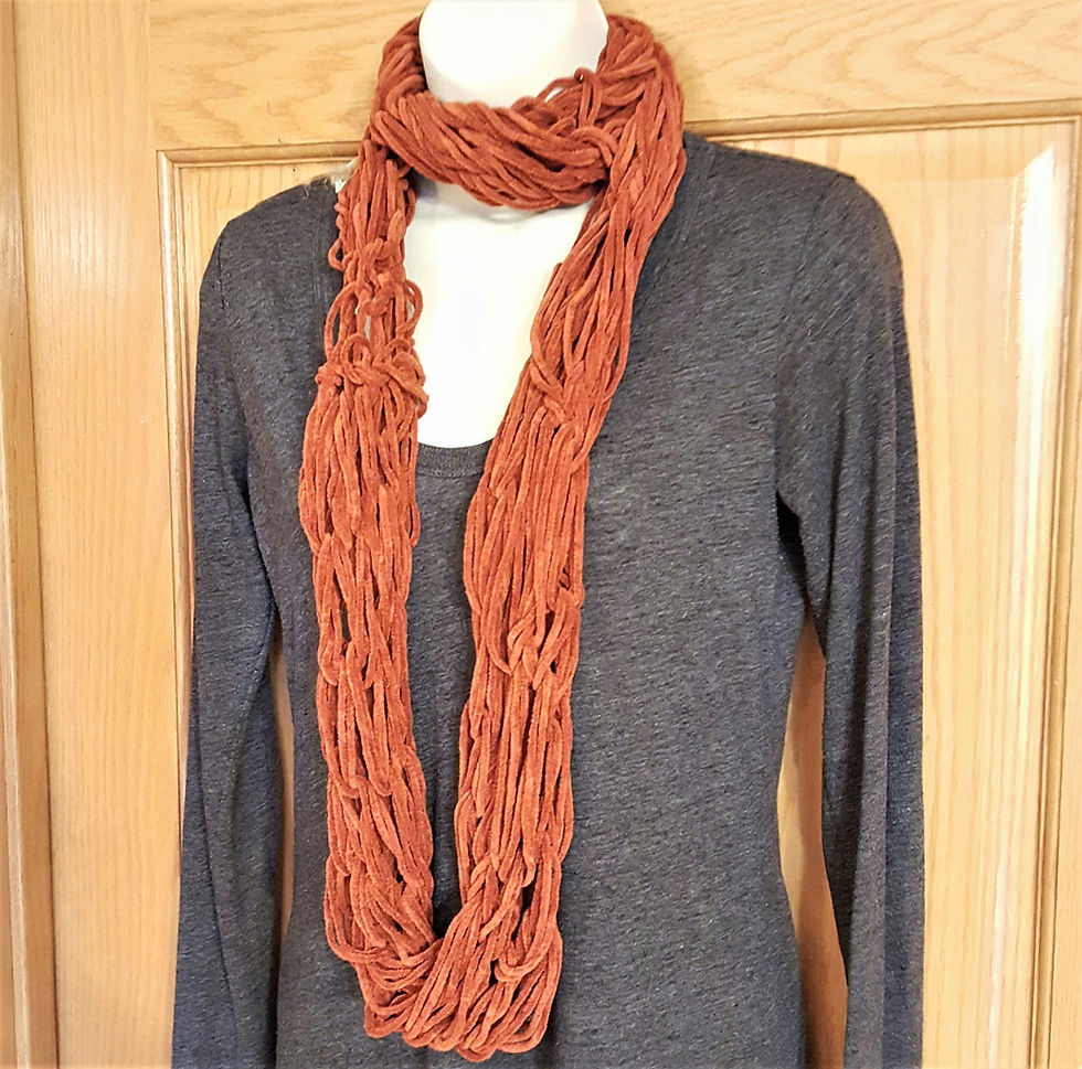 Thumbnail: Dark orange knit infinity scarf